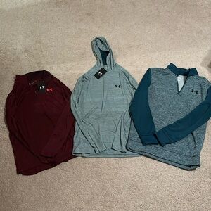 3 Under Armour men’s long sleeve shirts size small.